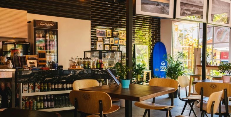 Stylish café interior with modern decor and natural lighting, located in Sochi, Russia.